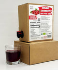 Organic Cranberry Juice Box Pure no added sugar with glass