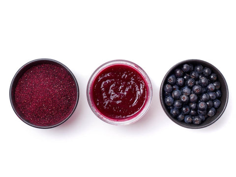 bowls with aronia berries powder jam